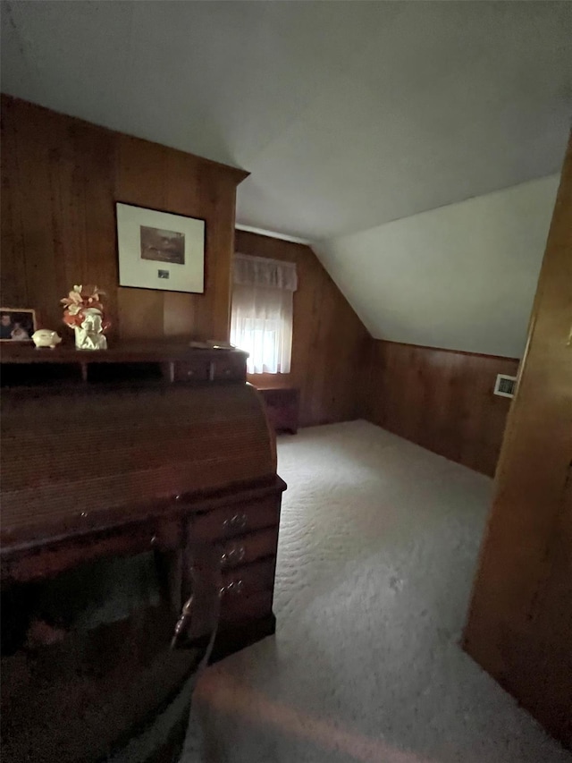 11 Crescent Dr, Cortlandt Manor, NY 10567 - additional living space featuring vaulted ceiling, wooden walls, and carpet