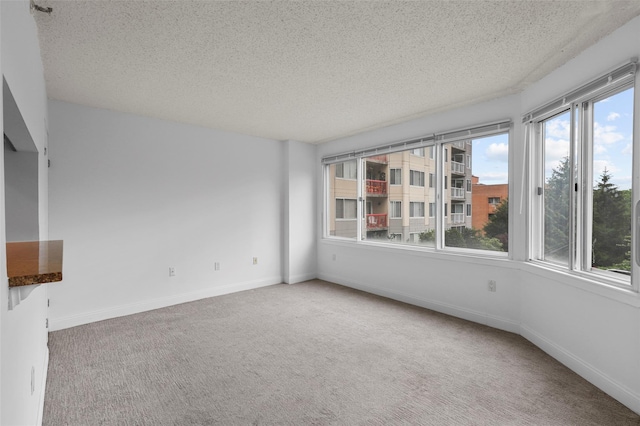 10Stewart Place 3Hw, White Plains, NY 10601 - carpeted empty room with a textured ceiling and healthy amount of natural light