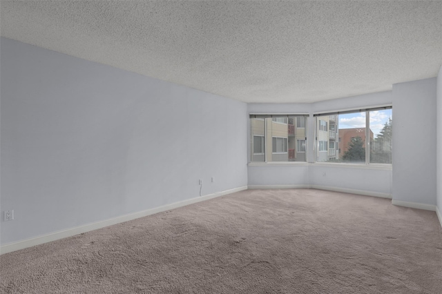 10Stewart Place 3Hw, White Plains, NY 10601 - unfurnished room featuring a textured ceiling and carpet flooring