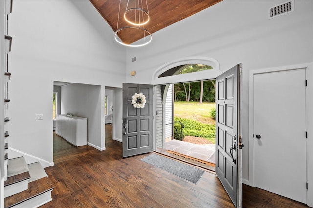 32 Pine Dr, Pound Ridge, NY 10576 - foyer entrance featuring wood finished floors, high vaulted ceiling, and wooden ceiling