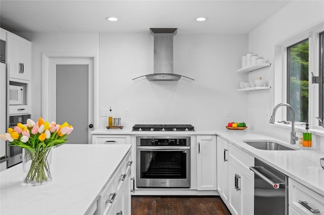 32 Pine Dr, Pound Ridge, NY 10576 - kitchen with appliances with stainless steel finishes, ventilation hood, light stone counters, backsplash, and white cabinets