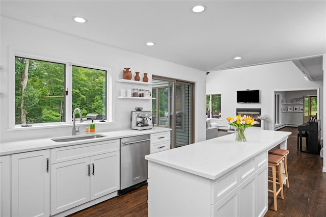 32 Pine Dr, Pound Ridge, NY 10576 - kitchen featuring dishwasher, a center island, white cabinetry, a breakfast bar, and recessed lighting