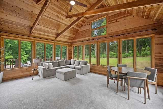 32 Pine Dr, Pound Ridge, NY 10576 - carpeted living area with plenty of natural light, wooden walls, a wood ceiling with exposed beams, high vaulted ceiling, and ceiling fan