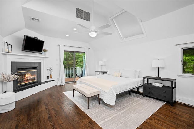 32 Pine Dr, Pound Ridge, NY 10576 - bedroom featuring vaulted ceiling, access to outside, wood finished floors, a tile fireplace, and a ceiling fan