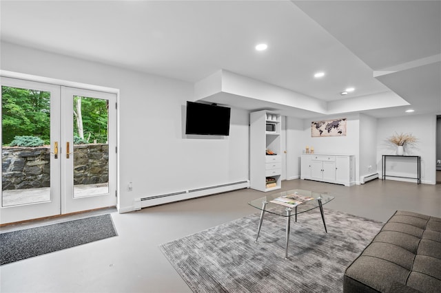 32 Pine Dr, Pound Ridge, NY 10576 - living room featuring baseboard heating, finished concrete flooring, recessed lighting, and french doors