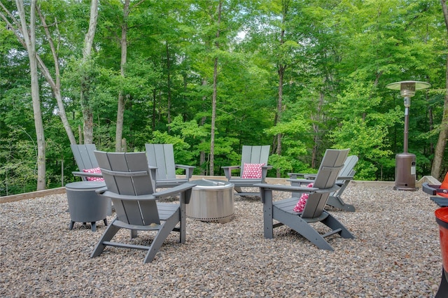 32 Pine Dr, Pound Ridge, NY 10576 - view of patio featuring an outdoor fire pit