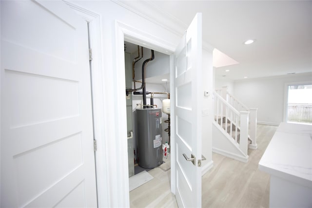 59 Stratford Grn Unit 59, Farmingdale, NY 11735 - utility room featuring water heater