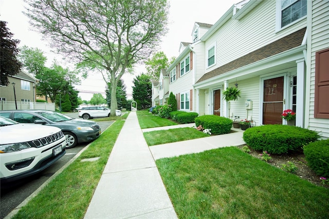 59 Stratford Grn Unit 59, Farmingdale, NY 11735 - view of green lawn featuring a residential view