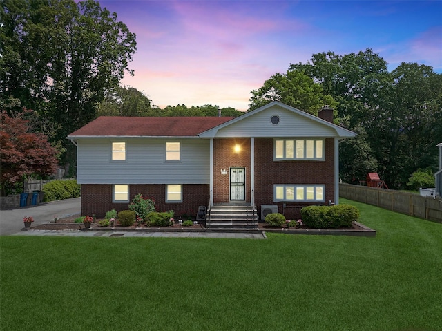 49 Oakridge Rd, North Salem, NY 10560 - bi-level home featuring brick siding and a chimney