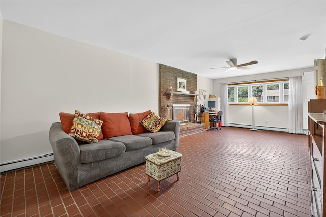 49 Oakridge Rd, North Salem, NY 10560 - living area with a baseboard radiator, brick floors, ceiling fan, and a fireplace