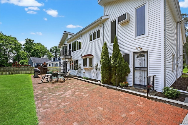 49 Oakridge Rd, North Salem, NY 10560 - back of property with a patio area and a wall mounted air conditioner