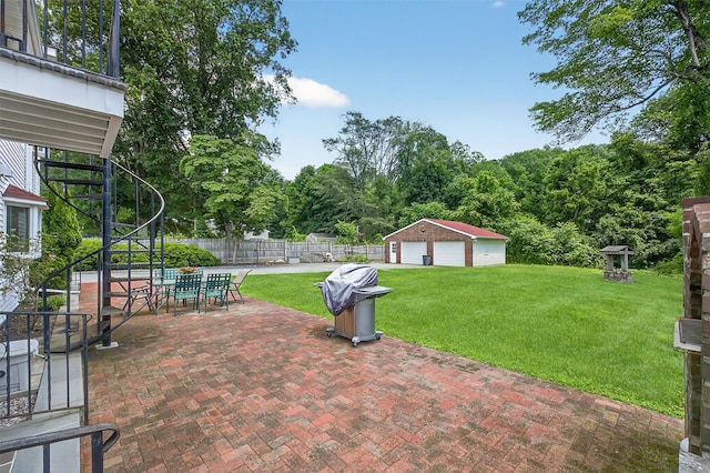 49 Oakridge Rd, North Salem, NY 10560 - view of patio / terrace with a detached garage, area for grilling, outdoor dining space, and an outbuilding