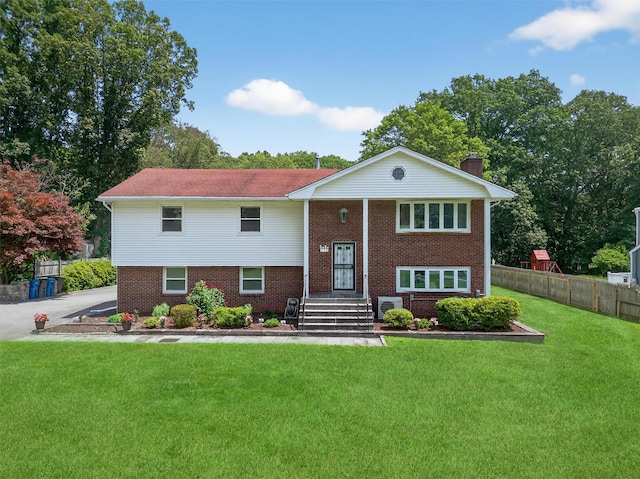 49 Oakridge Rd, North Salem, NY 10560 - bi-level home featuring brick siding and a chimney