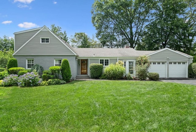 96 Highridge Rd, New Rochelle, NY 10804 - view of front facade featuring an attached garage, asphalt driveway, a chimney, and a front yard