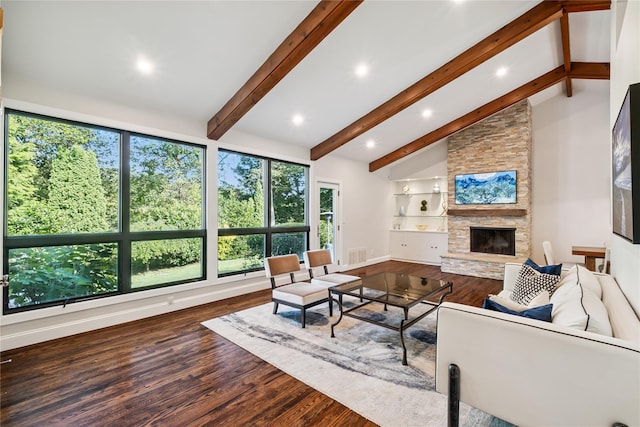 96 Highridge Rd, New Rochelle, NY 10804 - living area with a stone fireplace, wood finished floors, beam ceiling, recessed lighting, and high vaulted ceiling