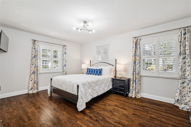 96 Highridge Rd, New Rochelle, NY 10804 - bedroom with a chandelier and wood finished floors