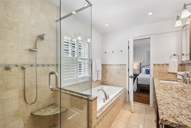 96 Highridge Rd, New Rochelle, NY 10804 - bathroom featuring vanity, a stall shower, a garden tub, connected bathroom, and tile patterned flooring
