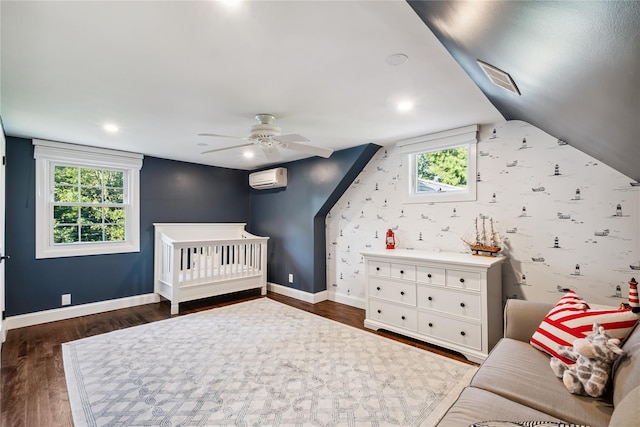 96 Highridge Rd, New Rochelle, NY 10804 - bedroom featuring dark wood-style flooring, a wall mounted AC, a crib, lofted ceiling, and a ceiling fan