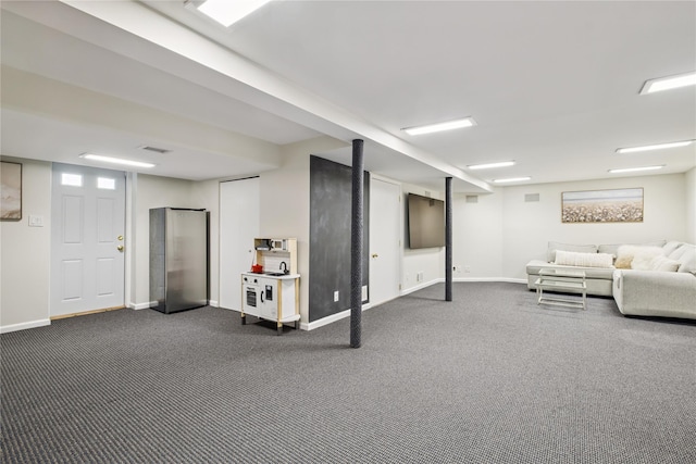 96 Highridge Rd, New Rochelle, NY 10804 - finished below grade area with freestanding refrigerator and dark carpet