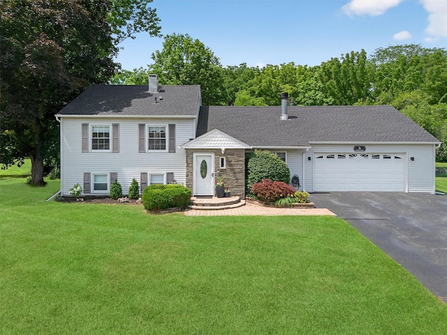 6 Spring Rock Rd, New Windsor, NY 12553 - tri-level home with asphalt driveway, a front yard, a chimney, an attached garage, and a shingled roof