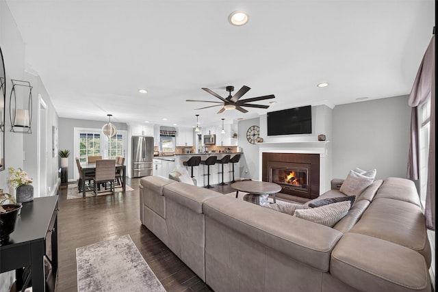 6 Spring Rock Rd, New Windsor, NY 12553 - living area featuring ceiling fan, a glass covered fireplace, recessed lighting, and dark wood-style flooring