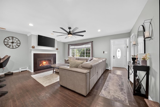 6 Spring Rock Rd, New Windsor, NY 12553 - living room with a baseboard heating unit, a ceiling fan, a fireplace, dark wood finished floors, and recessed lighting