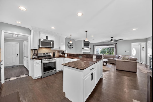 6 Spring Rock Rd, New Windsor, NY 12553 - kitchen with appliances with stainless steel finishes, a peninsula, open floor plan, white cabinetry, and ceiling fan