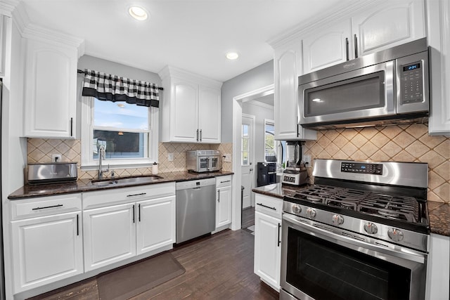 6 Spring Rock Rd, New Windsor, NY 12553 - kitchen with stainless steel appliances, white cabinets, backsplash, and recessed lighting