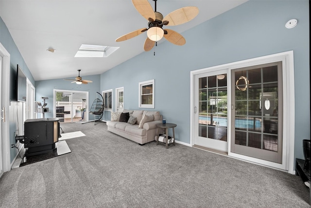 6 Spring Rock Rd, New Windsor, NY 12553 - carpeted living room featuring ceiling fan, a skylight, and high vaulted ceiling