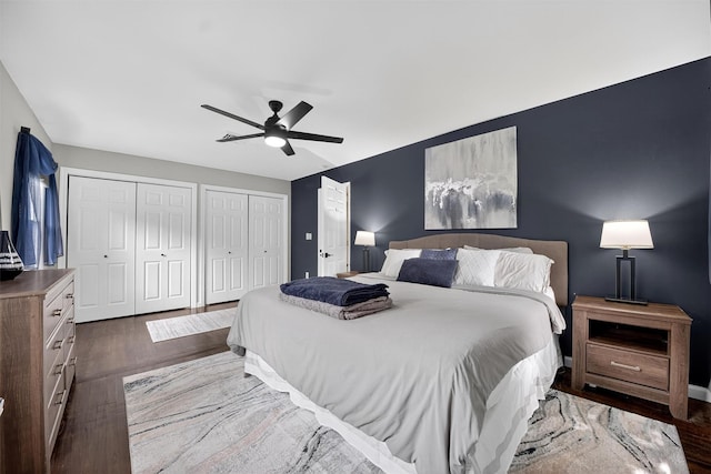 6 Spring Rock Rd, New Windsor, NY 12553 - bedroom with multiple closets, dark wood-style flooring, and a ceiling fan