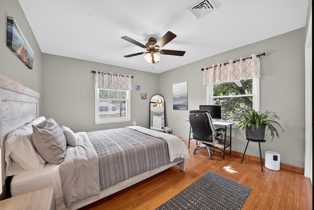 6 Spring Rock Rd, New Windsor, NY 12553 - bedroom with wood finished floors, a desk, and a ceiling fan