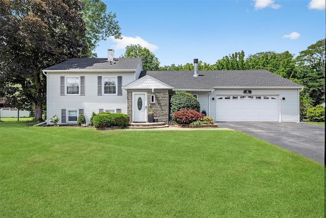 6 Spring Rock Rd, New Windsor, NY 12553 - split level home featuring driveway, a chimney, a front yard, and a garage