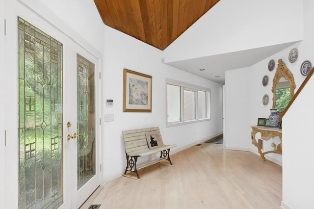 61 Hidden Cove Ct, Southampton, NY 11968 - entryway with light wood-style floors, wood ceiling, and high vaulted ceiling