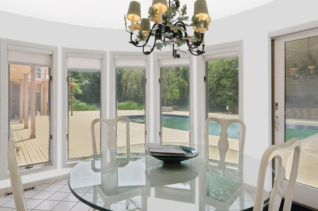 61 Hidden Cove Ct, Southampton, NY 11968 - dining space featuring light tile patterned floors and a chandelier