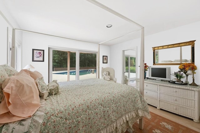61 Hidden Cove Ct, Southampton, NY 11968 - bedroom featuring access to outside and light wood-style flooring
