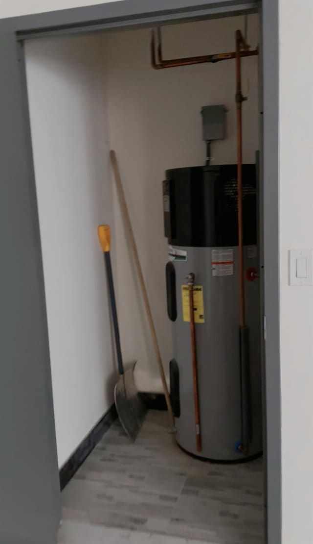 756 40th St Unit 1R, Brooklyn, NY 11232 - utility room featuring water heater