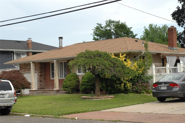 176 Floyd St, Brentwood, NY 11717 - single story home featuring a front lawn, a chimney, and a shingled roof