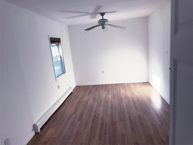 176 Floyd St, Brentwood, NY 11717 - spare room with a baseboard radiator, wood finished floors, and ceiling fan