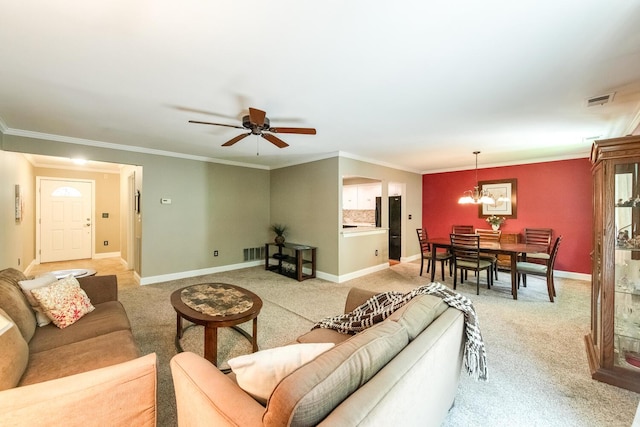 13 Knightsbridge Unit G, Poughkeepsie, NY 12603 - living room with light carpet, a chandelier, ornamental molding, and ceiling fan