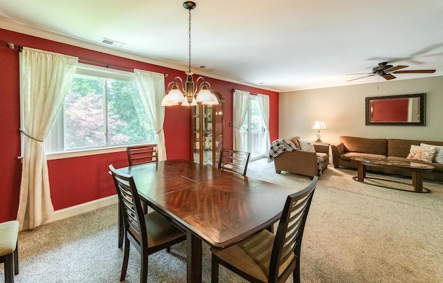 13 Knightsbridge Unit G, Poughkeepsie, NY 12603 - carpeted dining room with healthy amount of natural light, a chandelier, crown molding, and a ceiling fan
