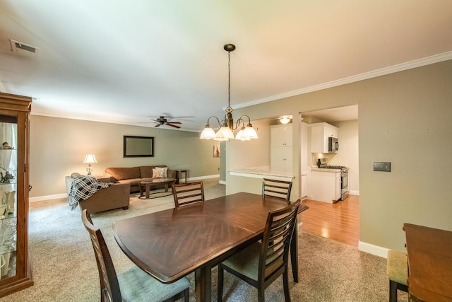 13 Knightsbridge Unit G, Poughkeepsie, NY 12603 - dining space featuring ornamental molding, light colored carpet, and ceiling fan