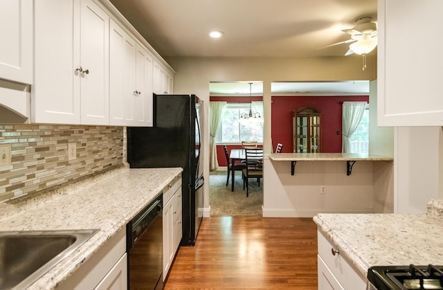 13 Knightsbridge Unit G, Poughkeepsie, NY 12603 - kitchen featuring black appliances, white cabinetry, decorative backsplash, ceiling fan, and recessed lighting