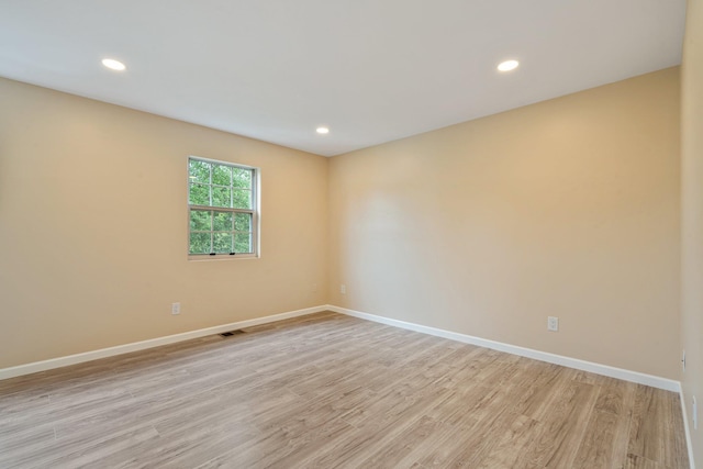 6 Doe Path, Coram, NY 11727 - spare room with light wood-style floors and recessed lighting