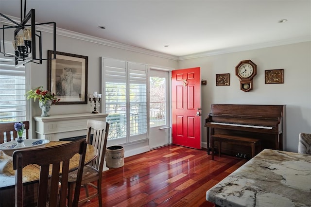 44 Hurlihe Unit 44, Poughkeepsie, NY 12601 - foyer entrance featuring plenty of natural light, wood finished floors, ornamental molding, a chandelier, and a fireplace