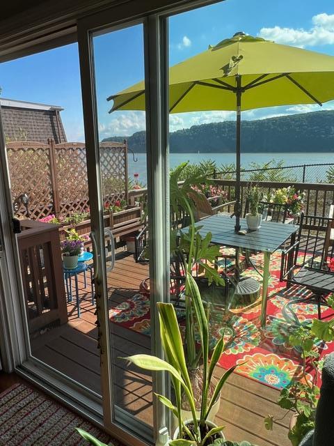 44 Hurlihe Unit 44, Poughkeepsie, NY 12601 - doorway with a water view and plenty of natural light