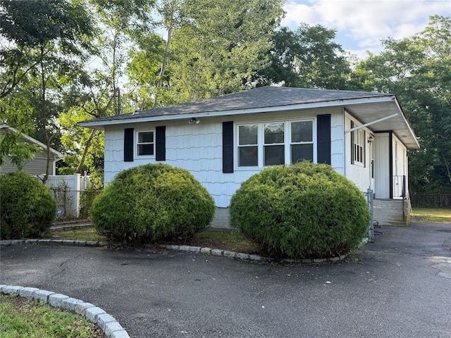 44 Edgewater Dr, Mastic Beach, NY 11951 - view of front of home with roof with shingles