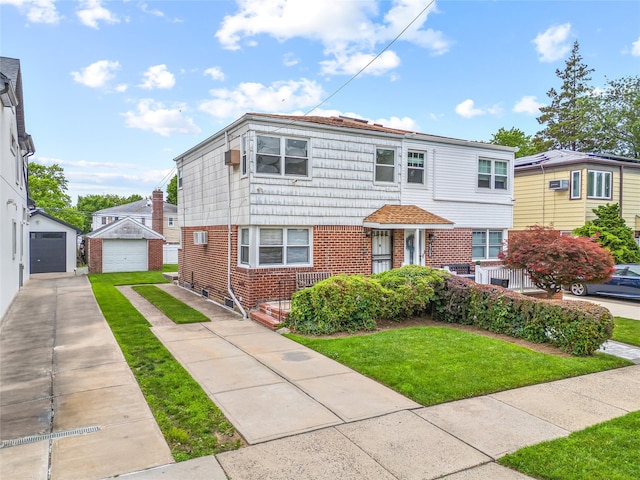 67-10 Bell Blvd, Bayside, NY 11364 - view of front facade featuring concrete driveway, brick siding, an outdoor structure, a front yard, and a garage