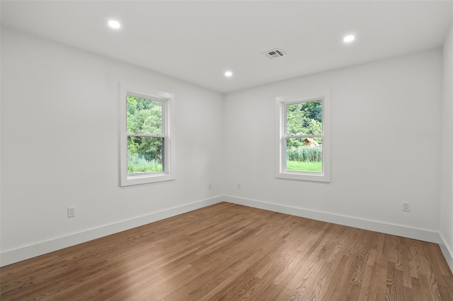 41 Forest Ave, Cortlandt Manor, NY 10567 - unfurnished room featuring healthy amount of natural light, recessed lighting, and light wood-style floors