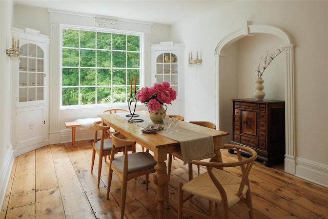 33 Scott Rd, Hudson, NY 12534 - dining room with light wood finished floors and arched walkways
