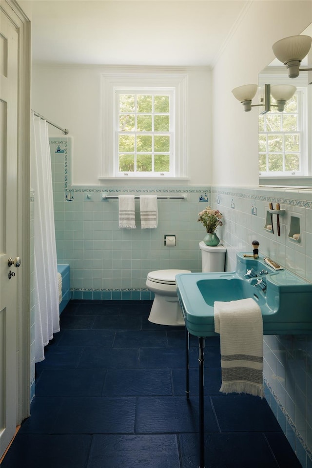 33 Scott Rd, Hudson, NY 12534 - bathroom with tile walls, shower / tub combo, ornamental molding, and a wainscoted wall